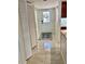 Bright hallway with tiled floor at 6430 Sun Eagle Ln # 203, Bradenton, FL 34210