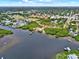 A beautiful aerial view highlights the waterfront community and the scenic surroundings at 748 Soundview Dr, Palm Harbor, FL 34683