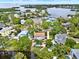Beautiful waterfront homes with lush landscaping, private pools, and boat docks line the tranquil bay at 748 Soundview Dr, Palm Harbor, FL 34683