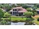 Aerial view of the home showing the swimming pool and surrounding landscape at 8016 Bounty Ln, Bradenton, FL 34202