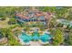 Aerial view of clubhouse, pool, and landscaping at 8016 Bounty Ln, Bradenton, FL 34202