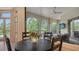 Cozy breakfast nook with picturesque views of the outdoor landscaping and natural light at 8016 Bounty Ln, Bradenton, FL 34202