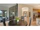 Bright breakfast nook with a round table, surrounded by large windows and natural light at 8016 Bounty Ln, Bradenton, FL 34202