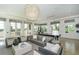 This clubhouse features a billiards table, comfortable couches and chairs for relaxation and entertainment at 8016 Bounty Ln, Bradenton, FL 34202