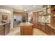 Spacious kitchen boasting stainless steel appliances and custom-designed cabinetry at 8016 Bounty Ln, Bradenton, FL 34202