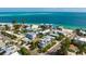 Coastal home with lush vegetation, close to turquoise waters and sandy beaches at 802 N Bay Blvd, Anna Maria, FL 34216