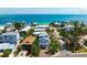 Stunning coastal home with direct beach access and panoramic ocean views, showcasing an idyllic seaside lifestyle at 802 N Bay Blvd, Anna Maria, FL 34216