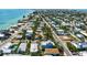 This aerial shot showcases the property's location within a vibrant coastal community with easy access to the beach at 802 N Bay Blvd, Anna Maria, FL 34216