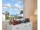 Bedroom view with Lego display, showing off the sunny water view at 802 N Bay Blvd, Anna Maria, FL 34216