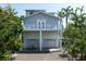 Coastal home with ample parking and second story balcony at 802 N Bay Blvd, Anna Maria, FL 34216
