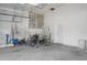 Spacious two-car garage with ample room for parking and storage, plus a door to the outside at 802 N Bay Blvd, Anna Maria, FL 34216
