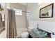 Bathroom with bathtub and shower combo, vanity, and toilet at 8103 Snowy Egret Pl, Bradenton, FL 34202