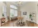 Bright breakfast nook with hardwood floors, large windows, and lots of natural light at 8103 Snowy Egret Pl, Bradenton, FL 34202