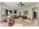 Open-concept living room flows seamlessly into the kitchen, perfect for entertaining guests and enjoying Gathering time at 8103 Snowy Egret Pl, Bradenton, FL 34202