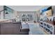Comfortable living room with modern decor and plenty of light at 845 Benjamin Franklin Dr # 302, Sarasota, FL 34236