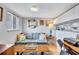 Cozy living room showcasing modern decor, comfortable seating, and a bright window at 845 Benjamin Franklin Dr # 302, Sarasota, FL 34236