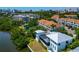 Overhead view of the condo community featuring beautiful landscaping and water views at 850 S Tamiami Trl # 431, Sarasota, FL 34236