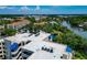 Scenic aerial view of lakeside residences with beautiful architectural details at 850 S Tamiami Trl # 431, Sarasota, FL 34236
