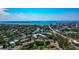 Aerial view of the neighborhood with waterways, residential buildings, and a coastal cityscape at 850 S Tamiami Trl # 431, Sarasota, FL 34236