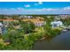 Picturesque waterfront community featuring lush landscaping, boat docks, and charming residences at 850 S Tamiami Trl # 431, Sarasota, FL 34236