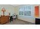 Bright desk area with shuttered window in a carpeted bedroom at 850 S Tamiami Trl # 431, Sarasota, FL 34236