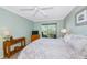 Bright bedroom with sliding glass doors leading to balcony at 850 S Tamiami Trl # 431, Sarasota, FL 34236
