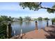 Enjoy the serene water view and waterfront activities from the community dock at 850 S Tamiami Trl # 431, Sarasota, FL 34236