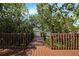 A charming wooden entryway to the community dock area at 850 S Tamiami Trl # 431, Sarasota, FL 34236