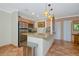 Well-lit kitchen features granite countertops, stainless steel appliances, and tile flooring at 850 S Tamiami Trl # 431, Sarasota, FL 34236