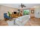 Cozy living room with tile flooring, plush white sofa, and a view of the lanai at 850 S Tamiami Trl # 431, Sarasota, FL 34236
