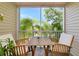 Screened patio featuring outdoor furniture and beautiful views at 850 S Tamiami Trl # 431, Sarasota, FL 34236