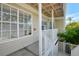 Balcony with lush, tropical plants and partial water views at 850 S Tamiami Trl # 431, Sarasota, FL 34236