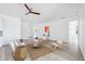 Bright living room featuring modern decor, neutral tones, and sleek flooring, offering an inviting space at 8622 Inwood Dr, Hudson, FL 34667
