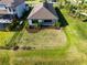 Aerial view of a well-manicured backyard in a home located in an attractive neighborhood at 10171 Milky Way Cir, Sarasota, FL 34241