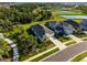 An aerial view of this house showing the ample green spaces surrounding the home in this neighborhood at 10171 Milky Way Cir, Sarasota, FL 34241