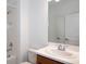 Bathroom featuring a combined tub and shower with white tile and a modern single sink vanity at 10171 Milky Way Cir, Sarasota, FL 34241
