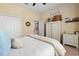 Bedroom with white dresser, walk-in closet, and neutral wall color at 11508 Griffith Park Ter, Bradenton, FL 34211