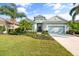 Charming one-story home featuring well-manicured landscaping and a welcoming two-car garage at 11508 Griffith Park Ter, Bradenton, FL 34211