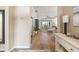 Bright foyer with tile flooring, offering a glimpse into the open-concept living space at 11508 Griffith Park Ter, Bradenton, FL 34211