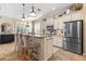 Charming eat-in kitchen with granite countertops, stainless steel appliances and pendant lighting at 11508 Griffith Park Ter, Bradenton, FL 34211