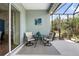 Intimate screened patio featuring a table and chairs for outdoor relaxation at 11508 Griffith Park Ter, Bradenton, FL 34211
