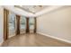 Bright, airy bedroom with large windows, tray ceilings, and hardwood floors at 12619 Sorrento Way, Bradenton, FL 34211