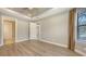 Bedroom with tray ceilings and hardwood floors at 12619 Sorrento Way, Bradenton, FL 34211