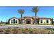 Beautiful clubhouse with lush landscaping and a circular drive at 12619 Sorrento Way, Bradenton, FL 34211