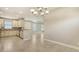 Charming kitchen featuring stainless steel appliances, tile floors, and attractive lighting at 12619 Sorrento Way, Bradenton, FL 34211