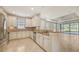 Open kitchen featuring stainless steel appliances, granite counters and breakfast bar at 12619 Sorrento Way, Bradenton, FL 34211