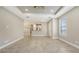 Open floor plan with tile flooring, recessed lighting, and offering connectivity to the kitchen at 12619 Sorrento Way, Bradenton, FL 34211