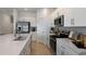 Gorgeous kitchen features stainless steel appliances, and ample counter space at 15172 Cuzcorro Ct, Nokomis, FL 34275