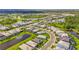 Beautiful aerial view of a new home community with ponds and lush green landscaping at 16226 Hidden Oak Loop, Bradenton, FL 34211