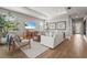 Bright living room with recessed lighting, hardwood floors, neutral paint, and stylish decor at 16226 Hidden Oak Loop, Bradenton, FL 34211